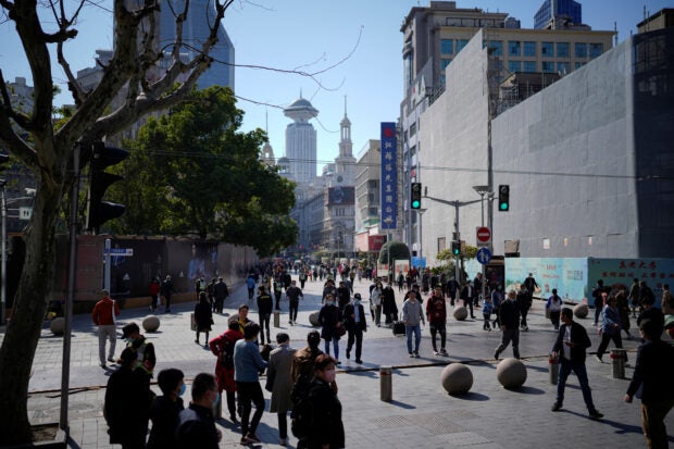 People at the main shopping area in Shanghai, China